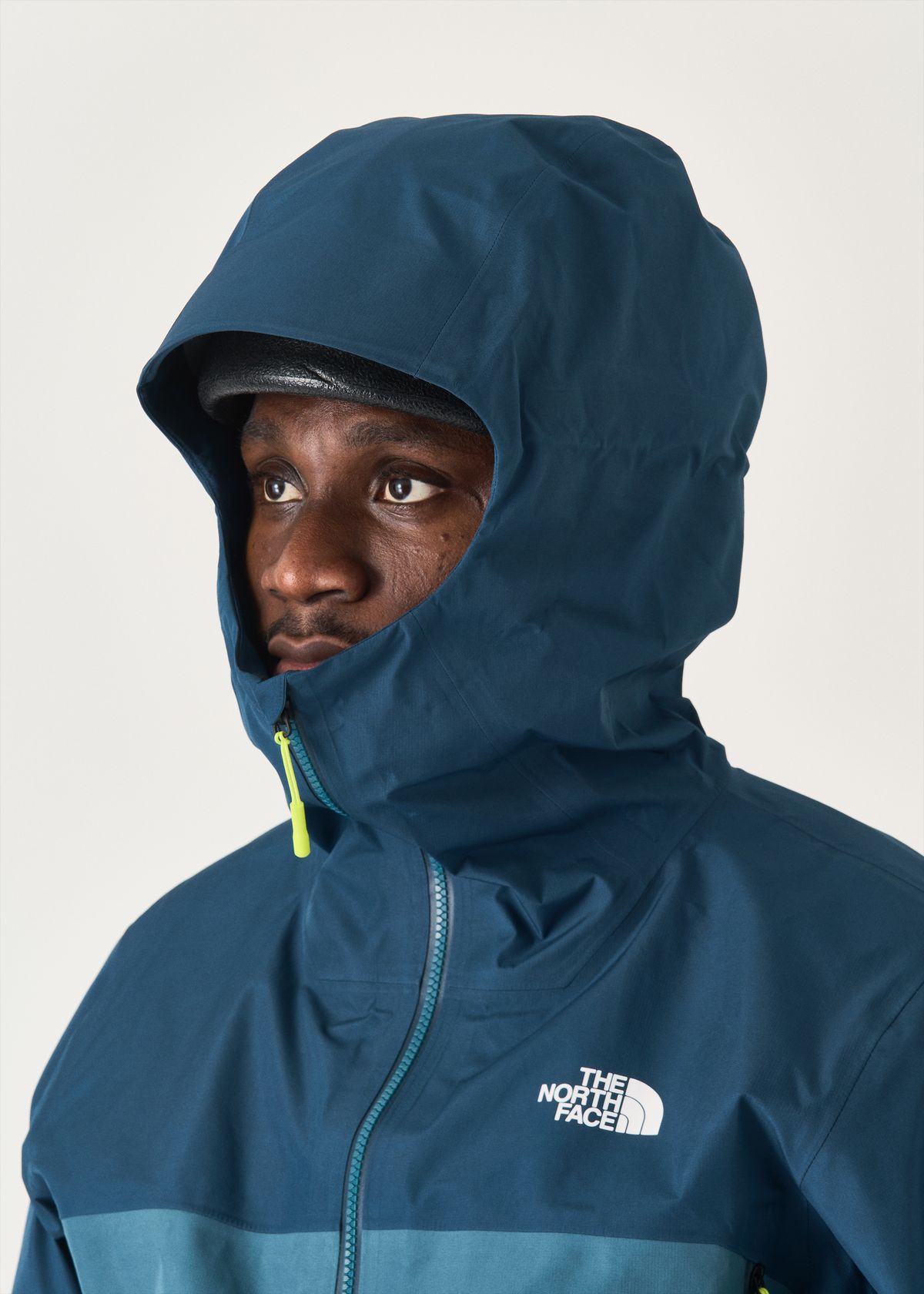 Adjustable helmet compatible hood