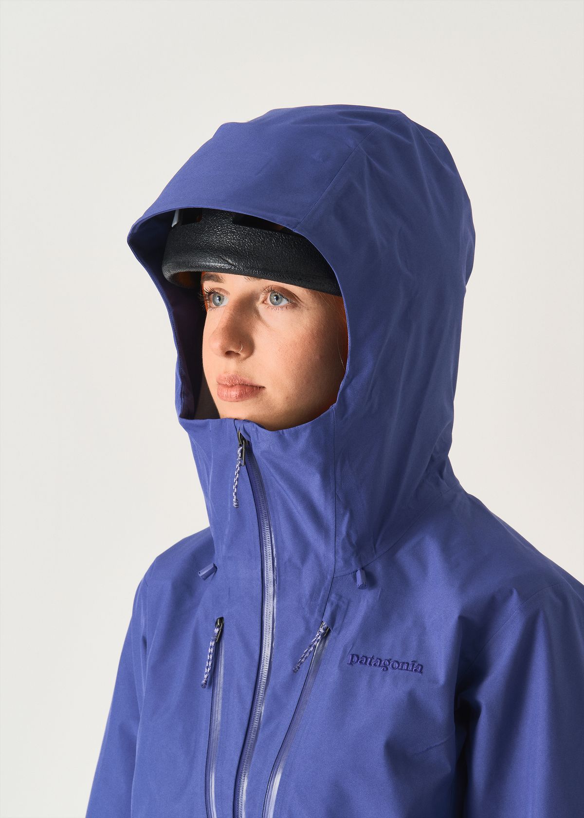 Adjustable helmet compatible hood