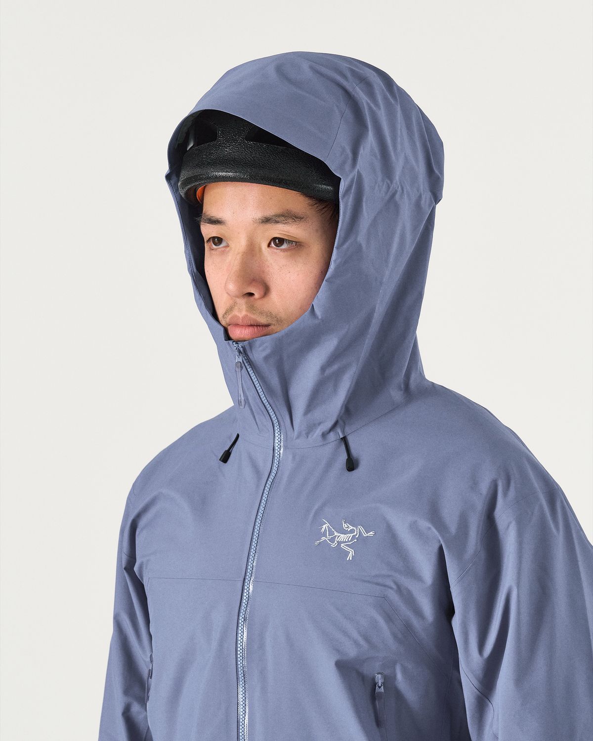 Adjustable helmet-compatible StormHood