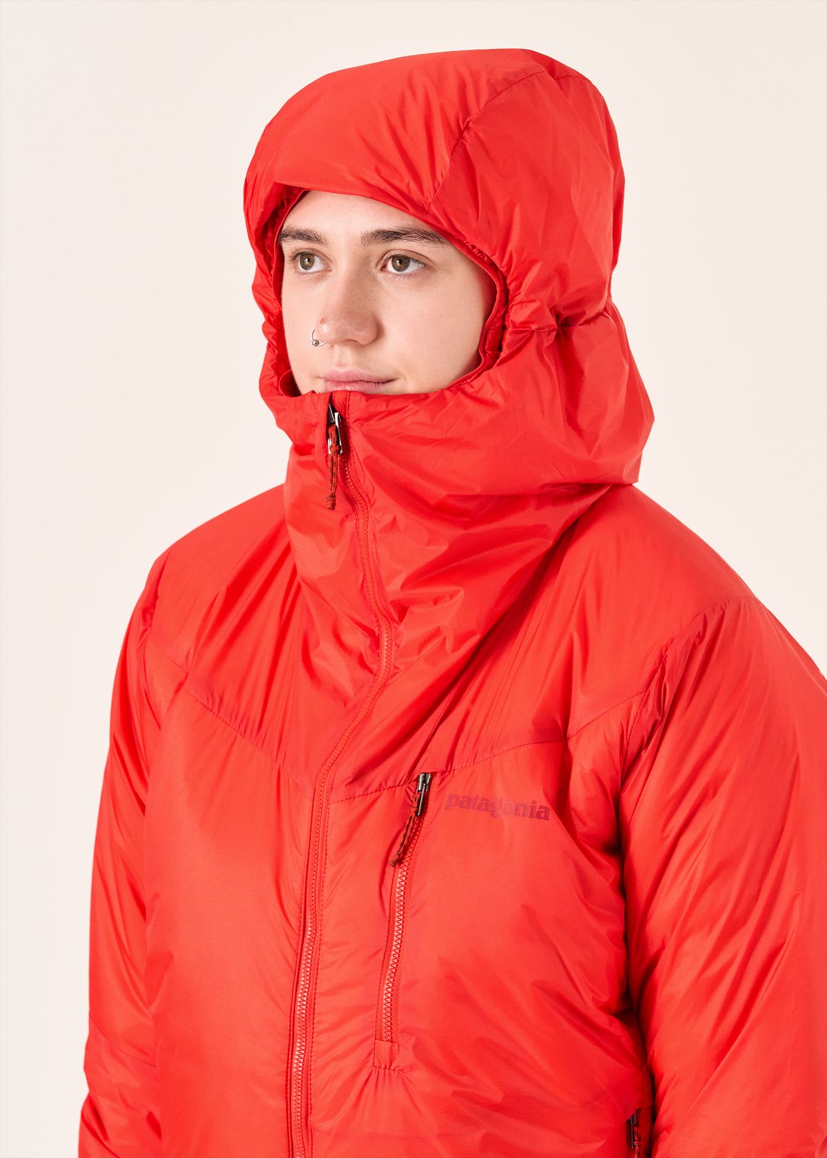 Adjustable helmet compatible hood