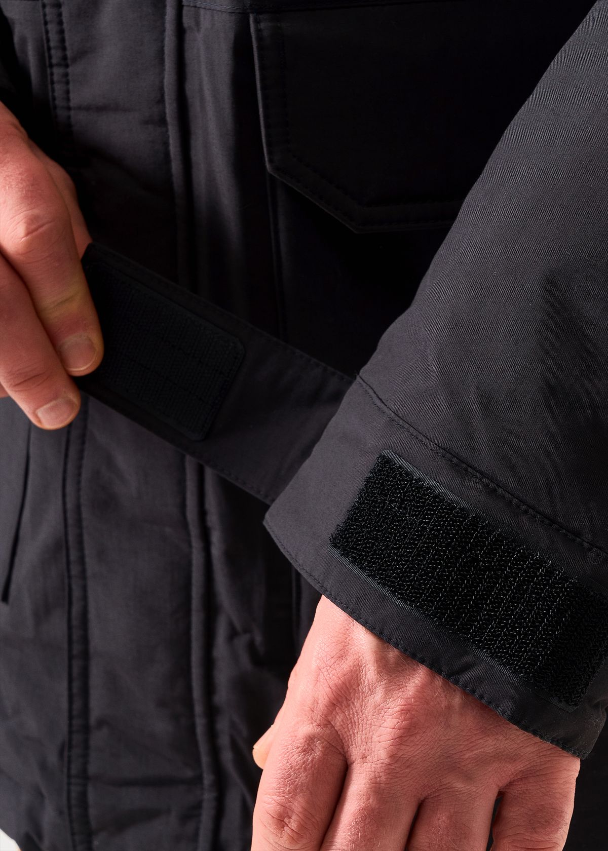 Adjustable hook-and-loop cuffs