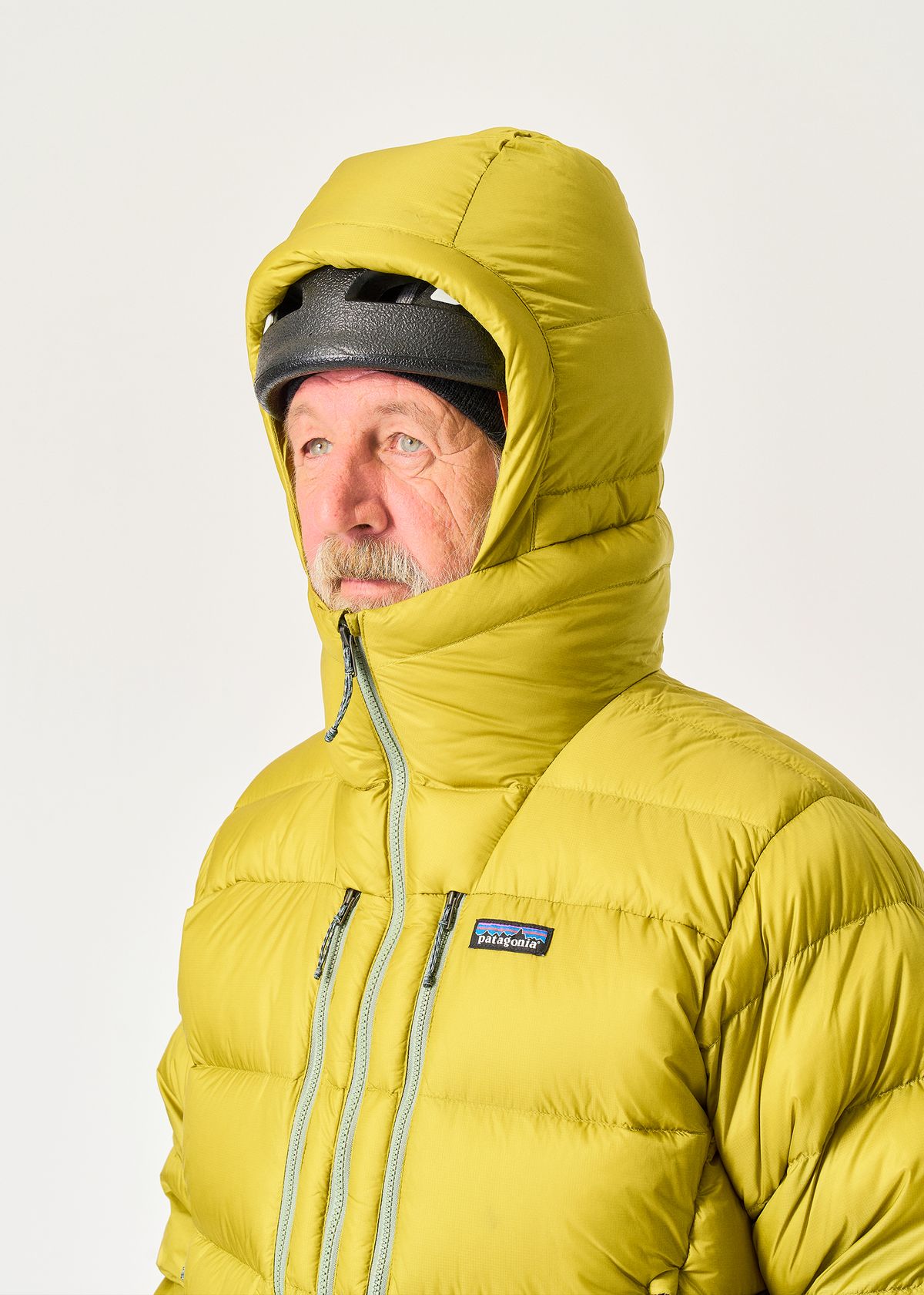  Adjustable helmet-compatible hood