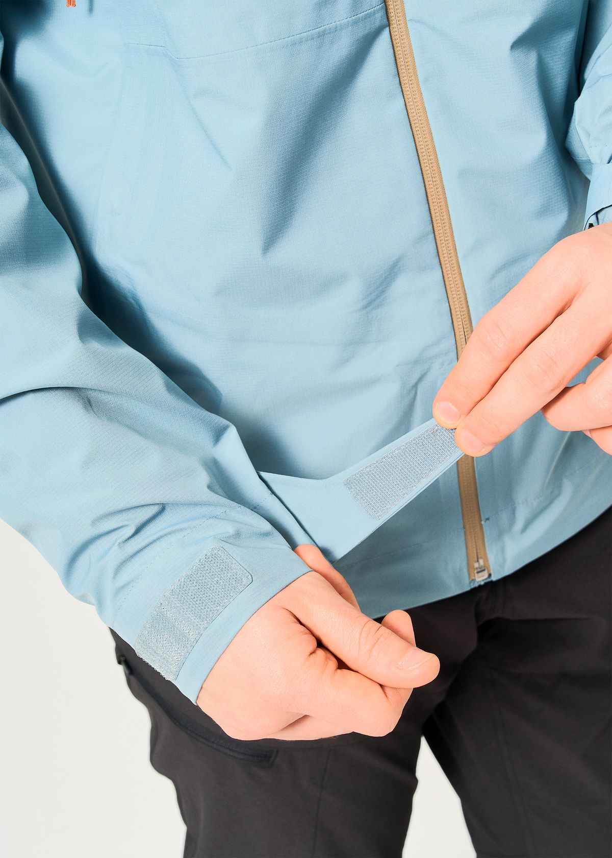 Hook-and-loop adjustable cuffs