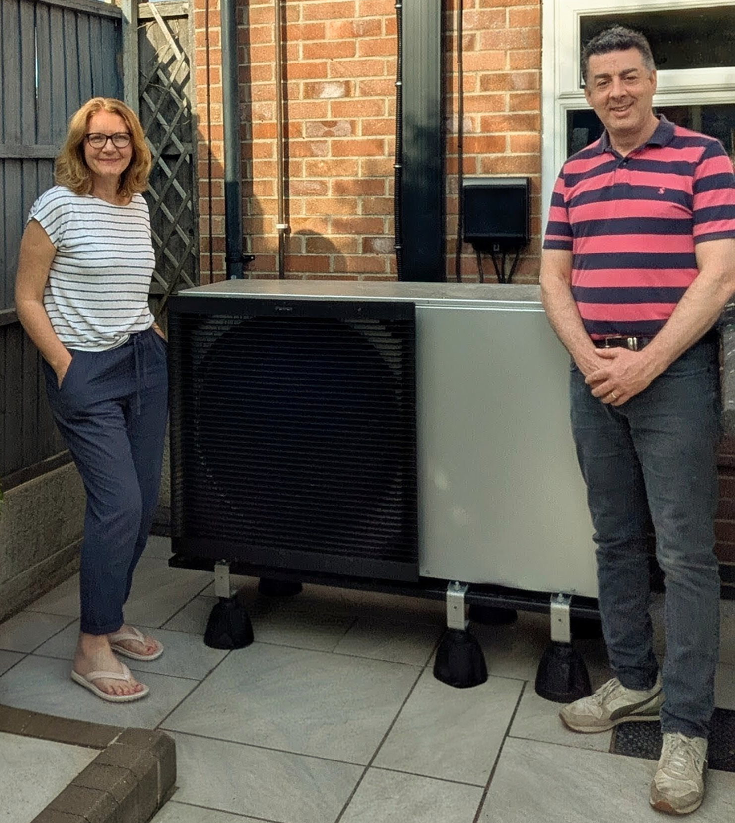 Octopus customer James and his wife, Charlotte, with their heat pump