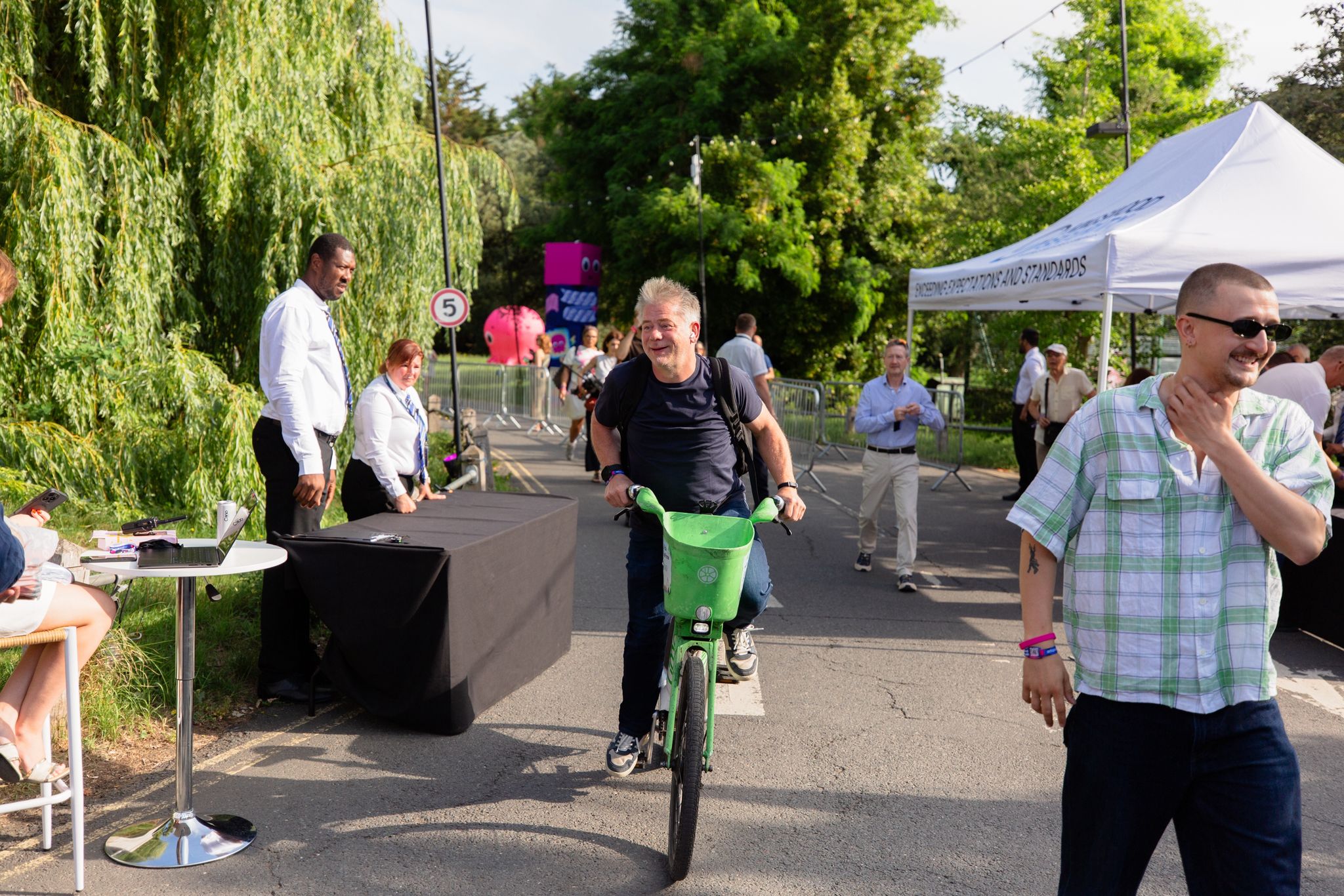 Greg Jackson rides a Lime Bike into the ETS summit