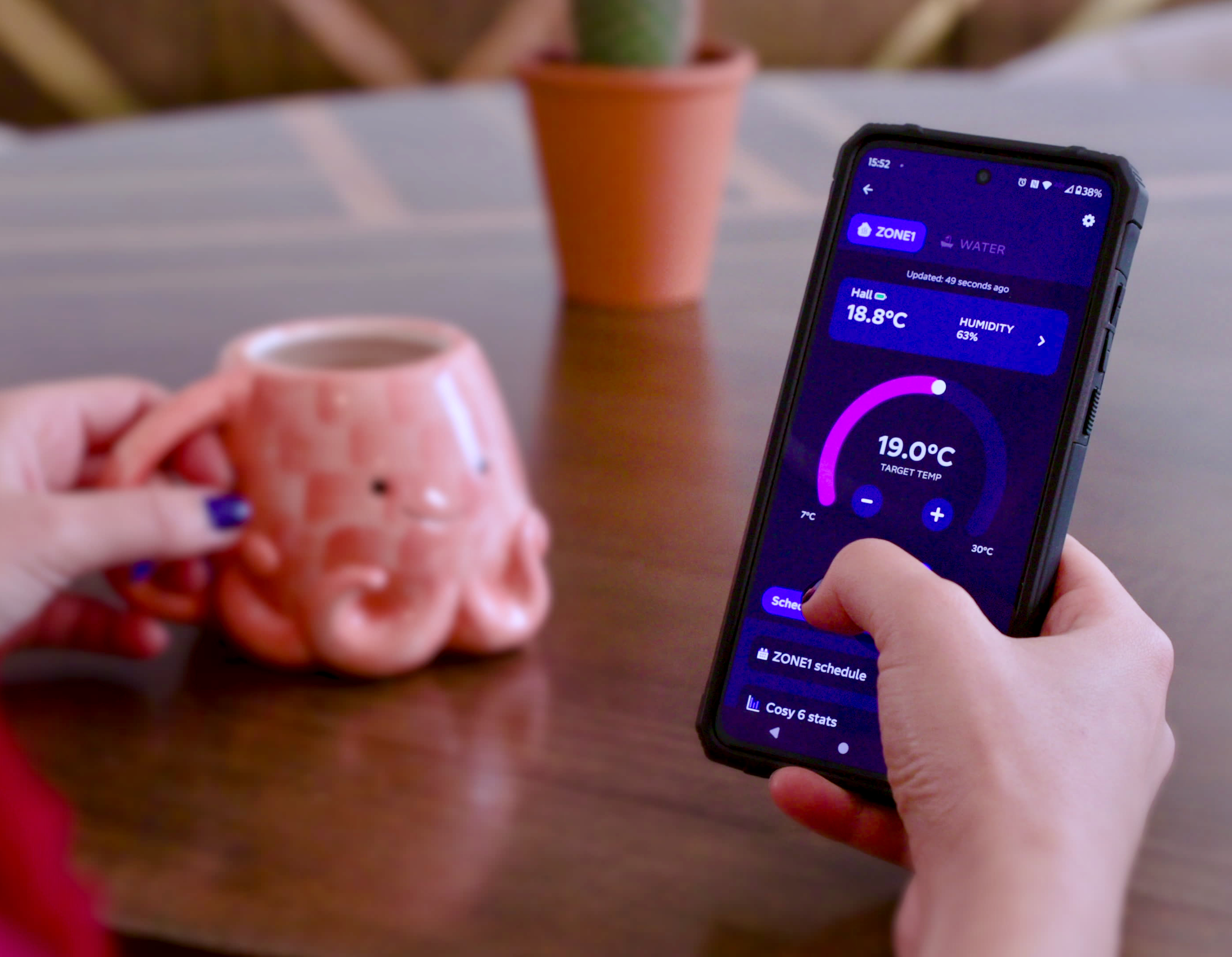 An Octopus customer checking out their heat pump controls on the app