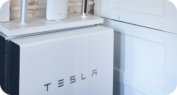 A tesla battery unit mounted on the wall