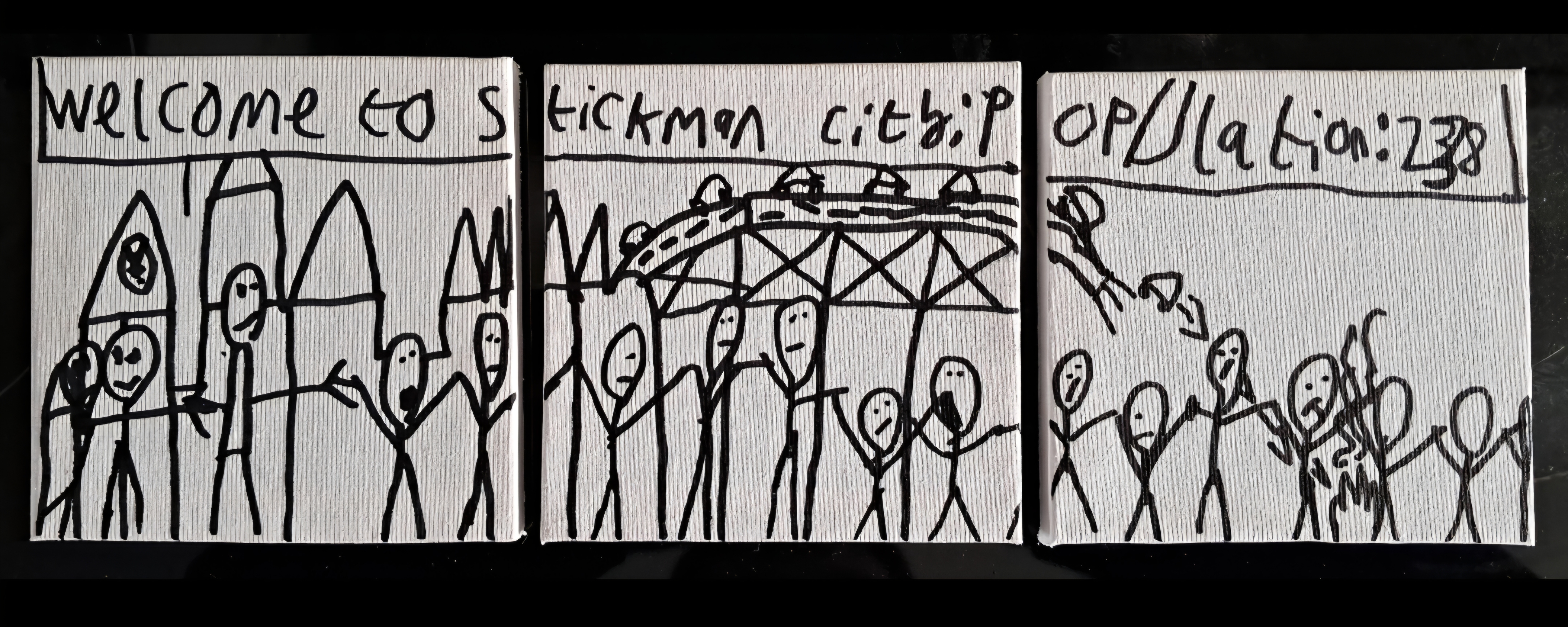 Simple black marker drawing of stick figures and buildings with the text "Welcome to Stickman City :P Population: 238".