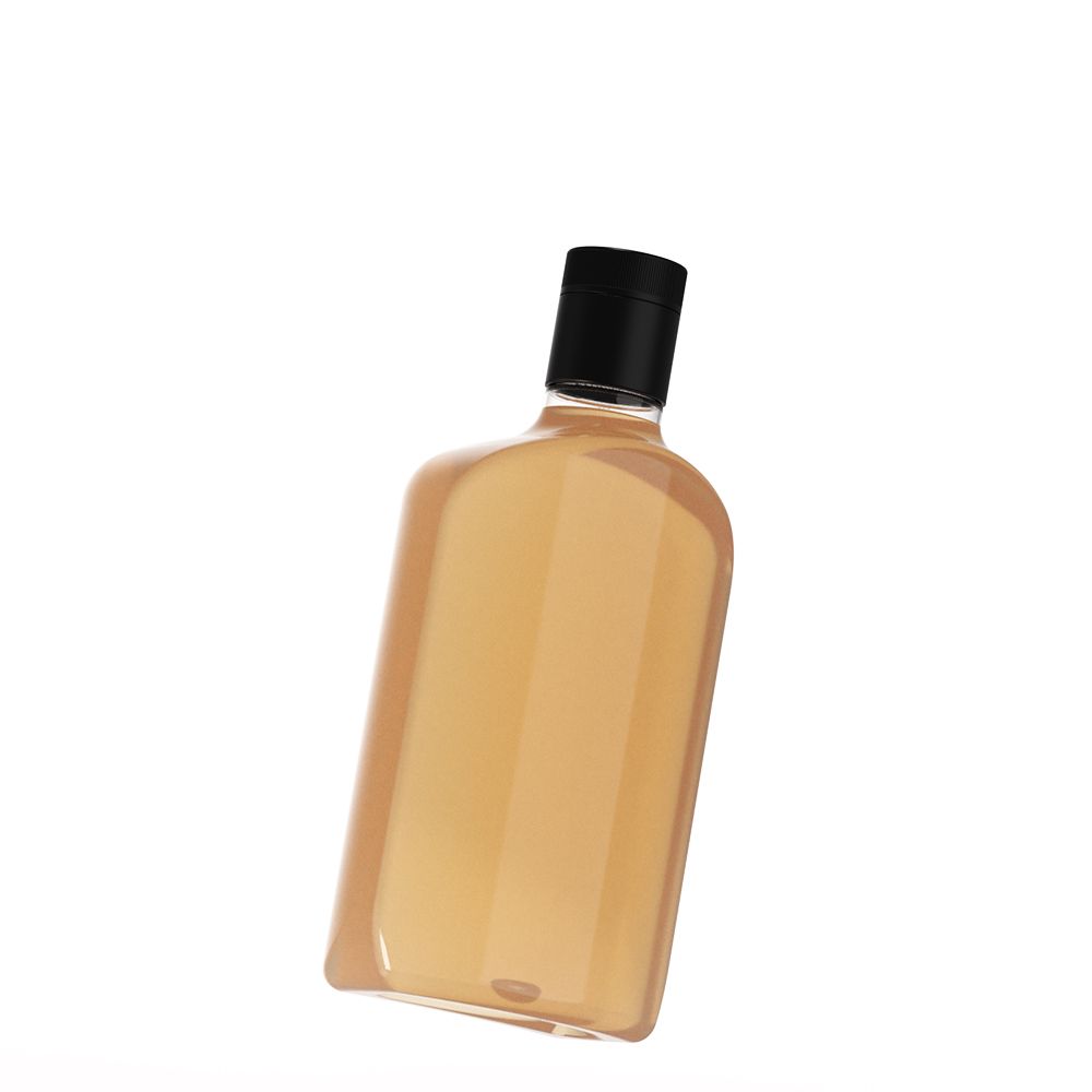 A plastic bottle for spirits by berlin packaging with a black cap, tilted slightly, against a white background.