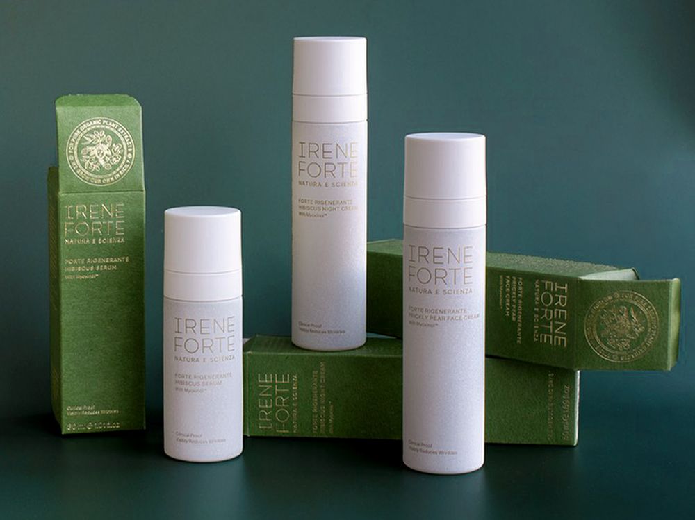 Coordinated primary and secondary packaging for Irene Forte Skincare, featuring refillable bottles and premium folding boxes