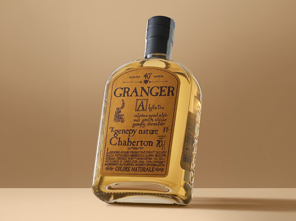 03_bp_em_spirits_success-stories_genepy-granger Angled view of the Genepy Granger alpine herbal liqueur bottle by Distilleria Erboristica Alpina, showcasing the complete premium packaging solution designed and developed by Berlin Packaging