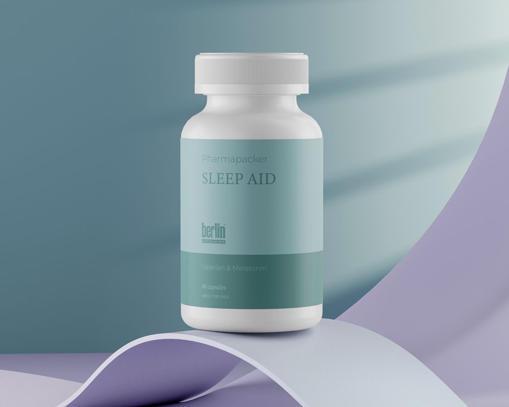 A bottle labeled "Pharmapacker Sleep Aid" with 60 capsules, featuring a minimalist design, on a purple and blue abstract background.