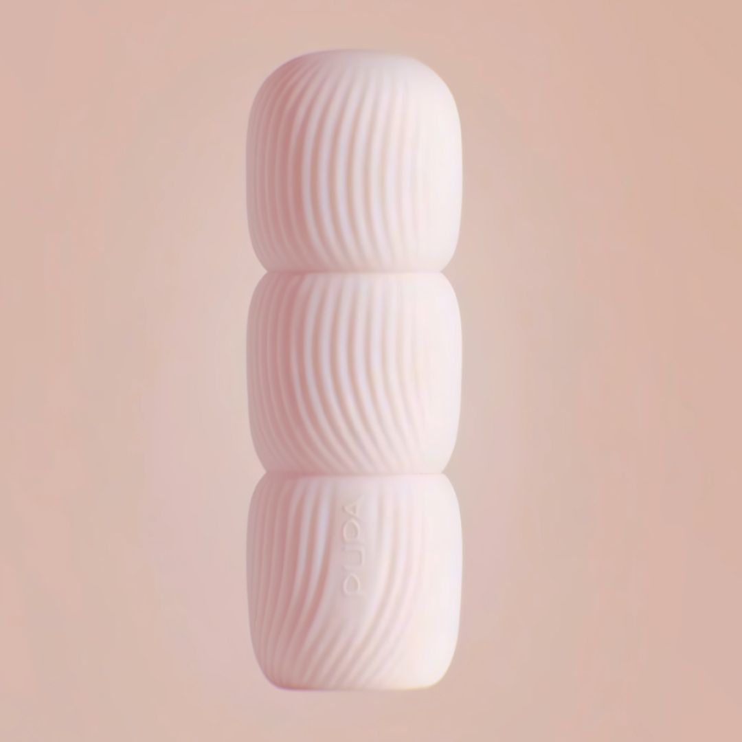 Pupa Milano My Crush lipstick closed packaging with ribbed textured cosmetic case on soft pink background, highlighting material design and premium beauty packaging.