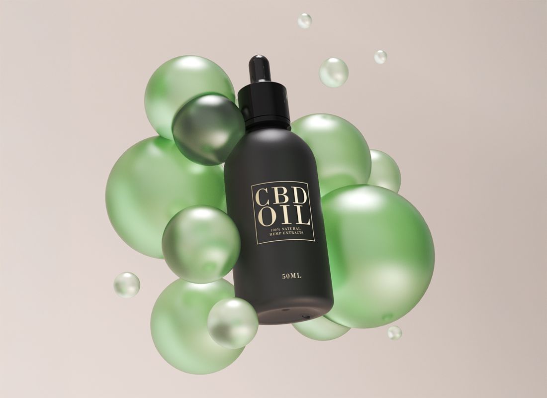 A black CBD oil bottle with a dropper, labeled "50ML," surrounded by floating green bubbles on a neutral background.