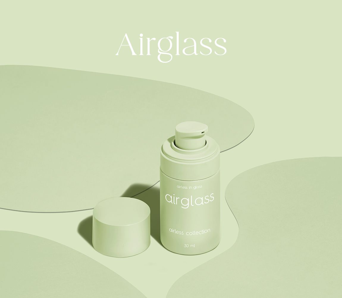 .Airglass airless packaging in pastel green, featuring a cylindrical 30 ml bottle with pump and cap, displayed on a minimal background with organic shapes.