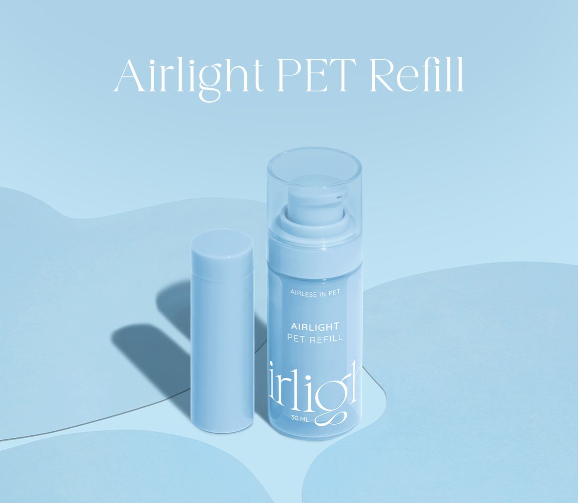 Airlight PET Refill packaging in pastel blue, displaying a 30 ml airless PET bottle with pump and a refill cartridge, emphasizing lightweight and sustainable design.