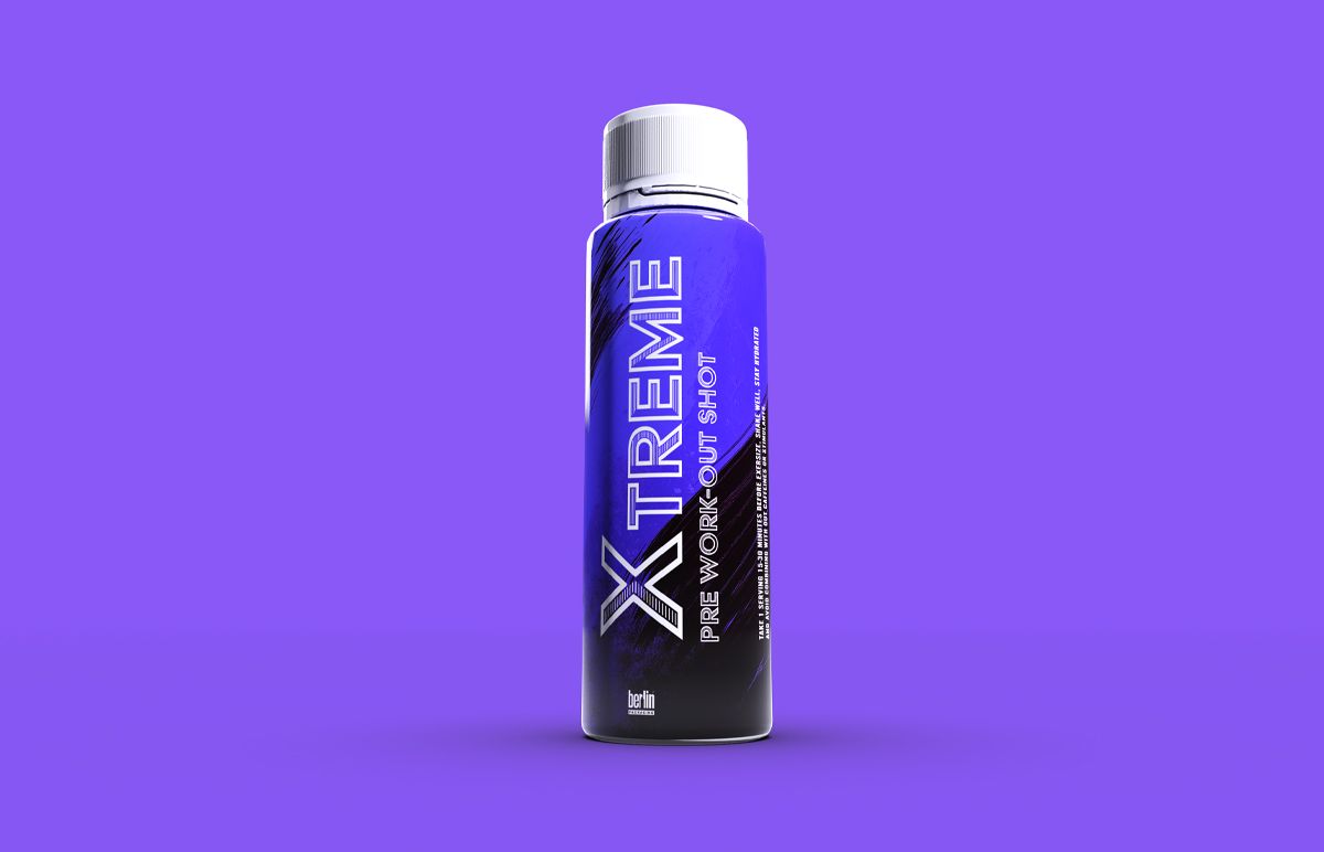 X-Treme pre-workout shot bottle standing upright on a purple background X-Treme pre-workout shot bottle standing upright on a purple background