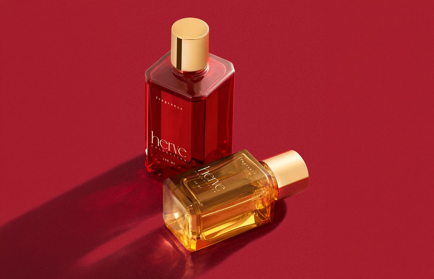 bp_ss_news_herve1 Herve pacakging collection by Berlin Packaging Beauty featuring fragrance bottles with a distinctive square design, thick glass base and premium metallized caps, showcasing elegant packaging solutions for contemporary fragrance brands.