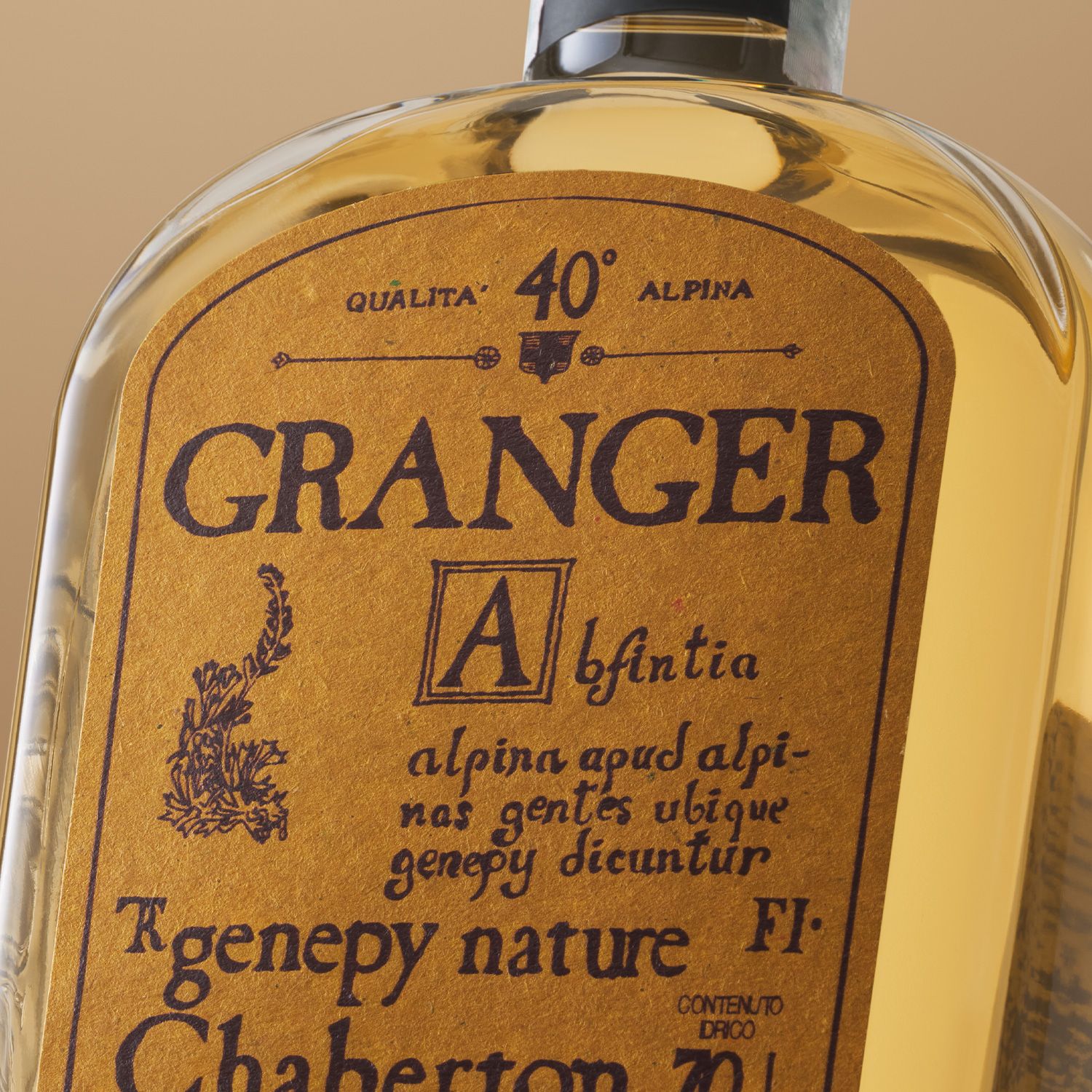 06_bp_em_spirits_success-stories_genepy-granger Close-up of the Genepy Granger label on an alpine herbal liqueur bottle by Distilleria Erboristica Alpina, highlighting the custom label and packaging design developed by Berlin Packaging