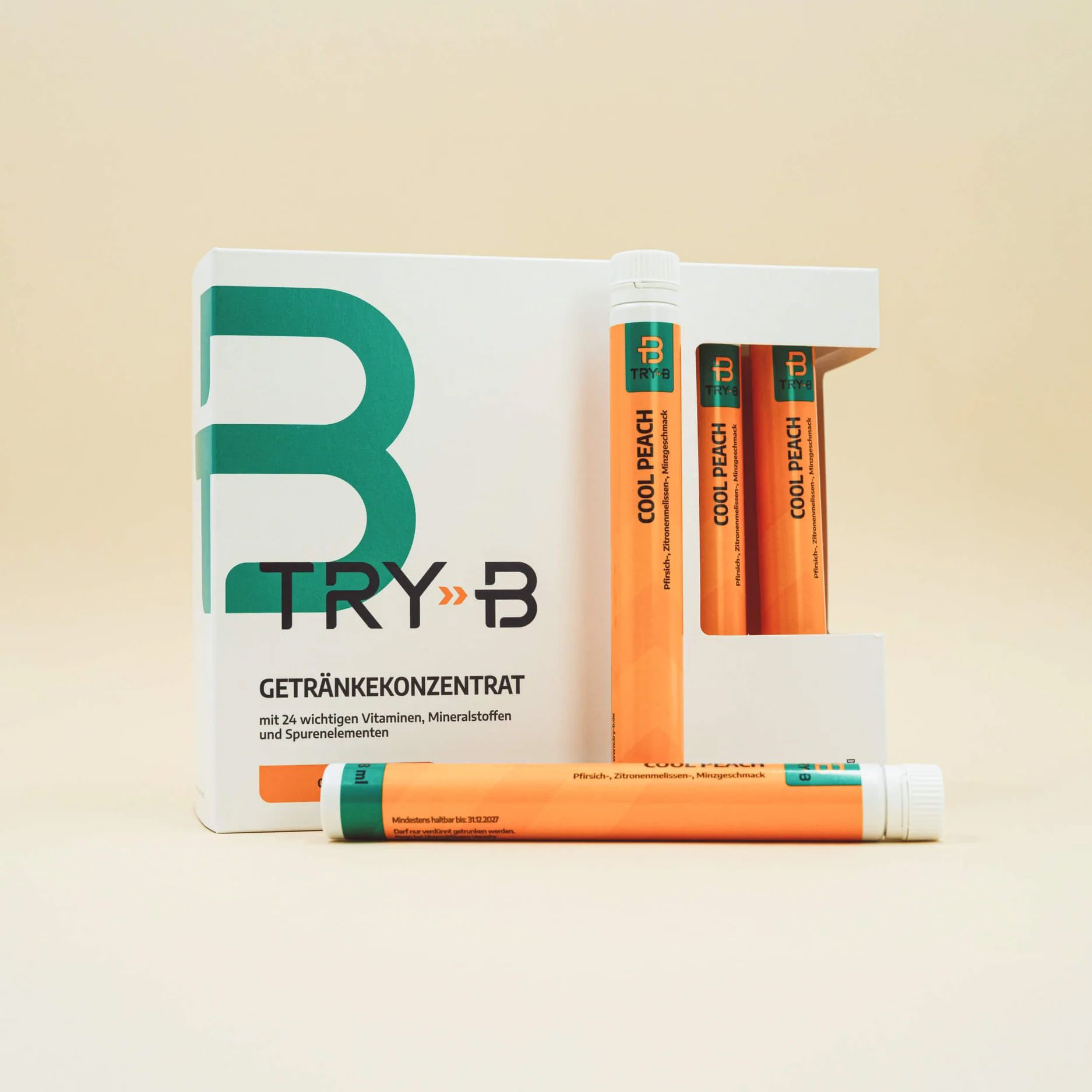 TRY B Grapefruit Splash beverage concentrate box with three pink flavor sticks and a grapefruit slice in front