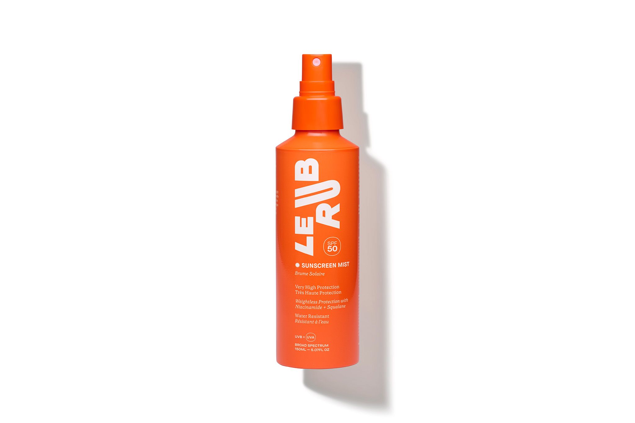 Le Rub sunscreen Mist A bright orange bottle of “LE RUB” sunscreen mist with SPF 50 displayed against a plain white background.