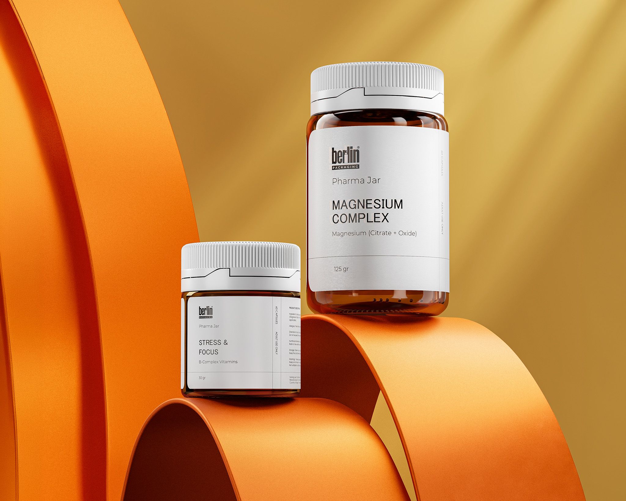 Glass Pharma Jars 4 Two supplement jars, "Stress & Focus" and "Magnesium Complex," displayed on curved orange surfaces, with a warm backdrop.