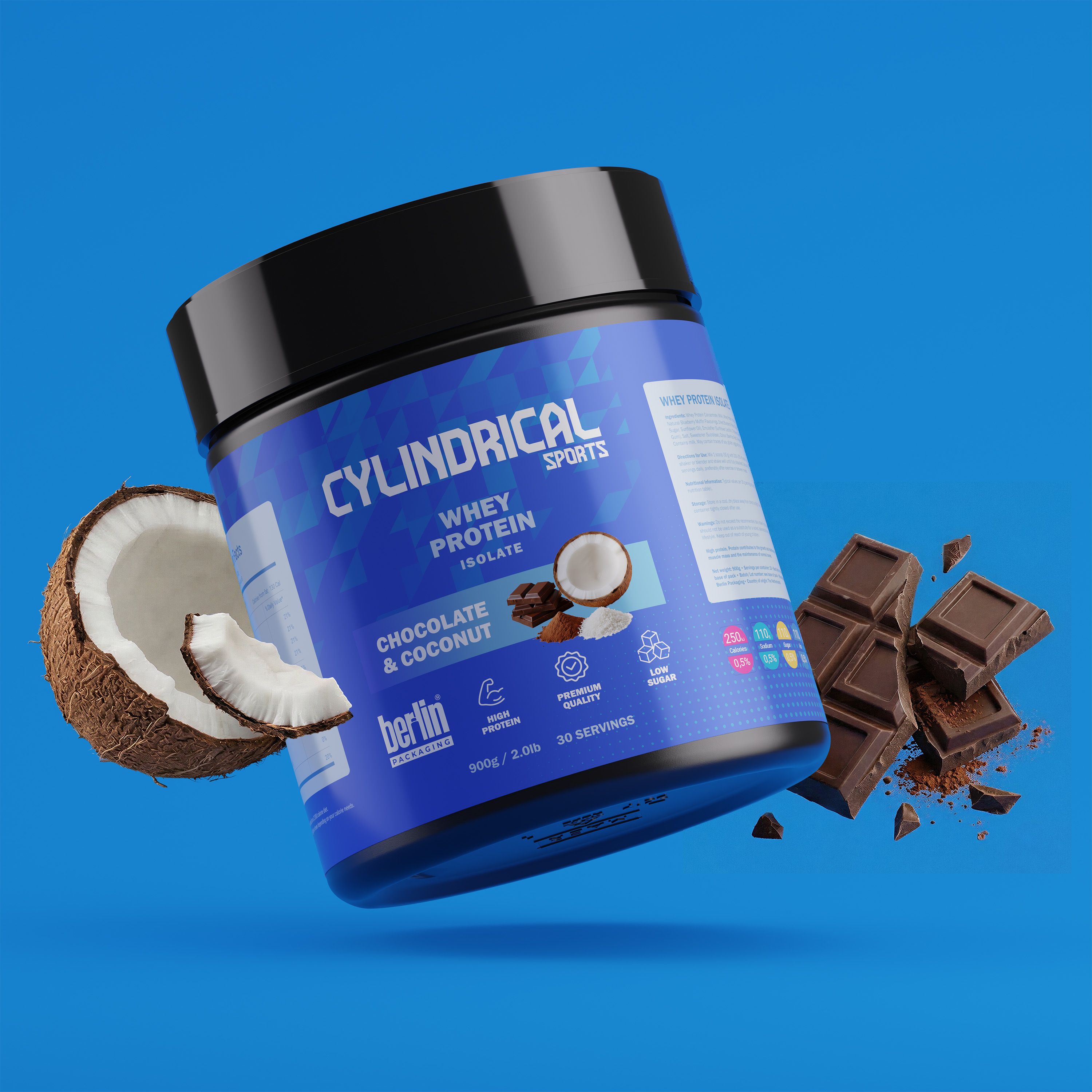 Cylindrical whey protein tub in Chocolate & Coconut flavor on a blue background, surrounded by coconut halves and broken chocolate pieces.