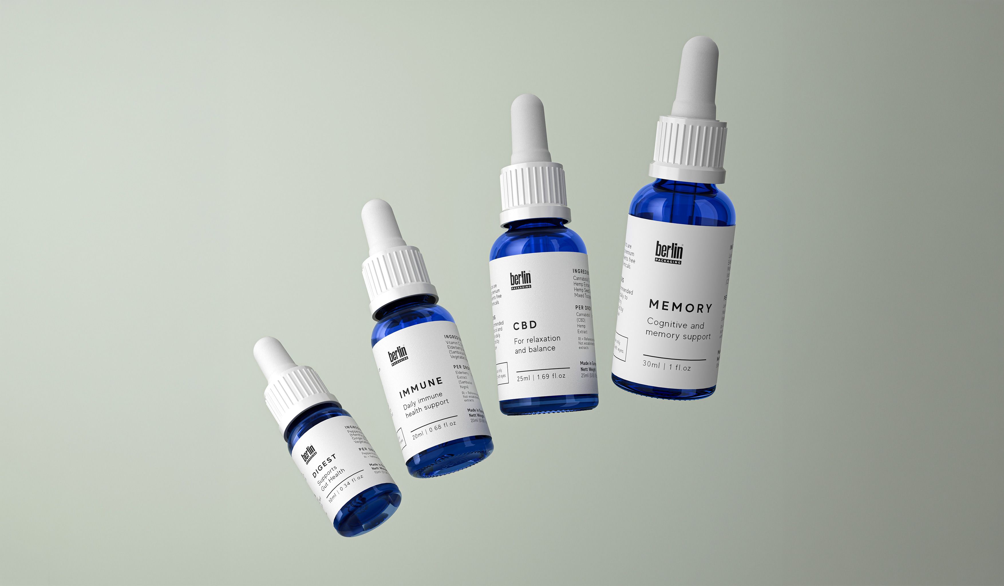Four blue dropper bottles with labels for Digest, Immune, CBD, and Memory supplements on a light gray background.