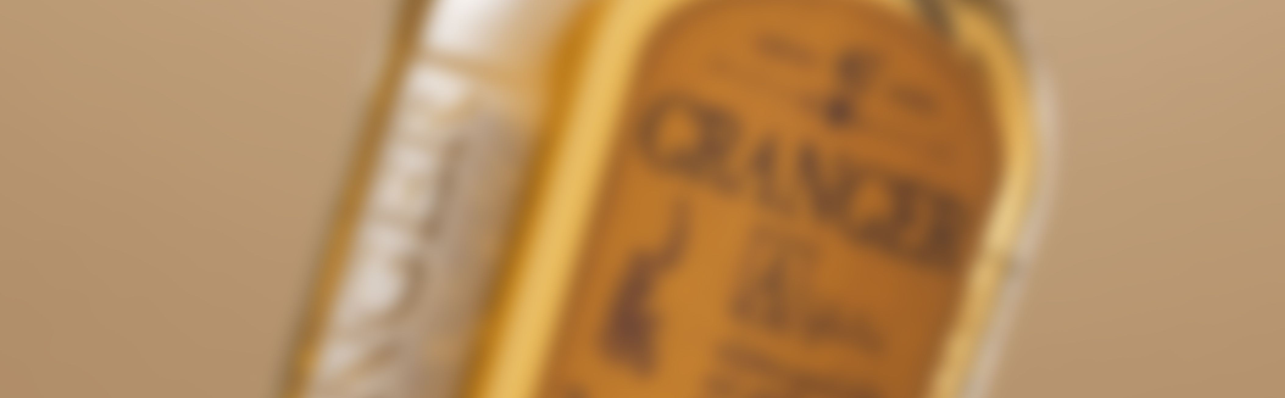 Close-up detail of the Genepy Granger bottle label for alpine herbal liqueur by Distilleria Erboristica Alpina, showcasing the premium packaging developed by Berlin Packaging