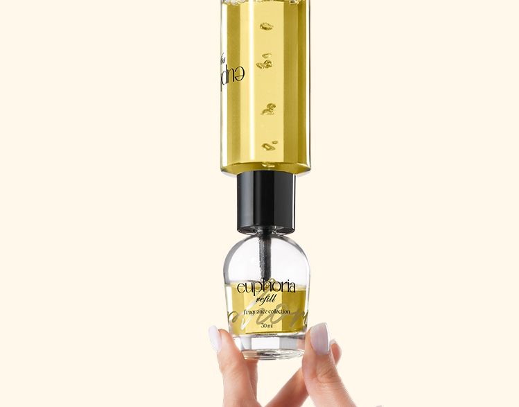 Euphoria Refill 50 ml by Berlin Packaging Beauty, refillable fragrance packaging system with stacked glass bottles and visible liquid, showcasing modular refill design and sustainable perfume packaging.