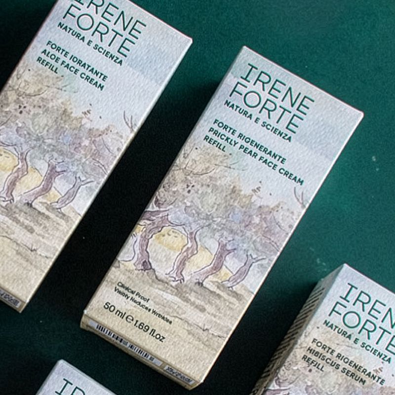 Coordinated secondary packaging for Irene Forte Skincare, showing premium boxes designed for refillable face creams and serums