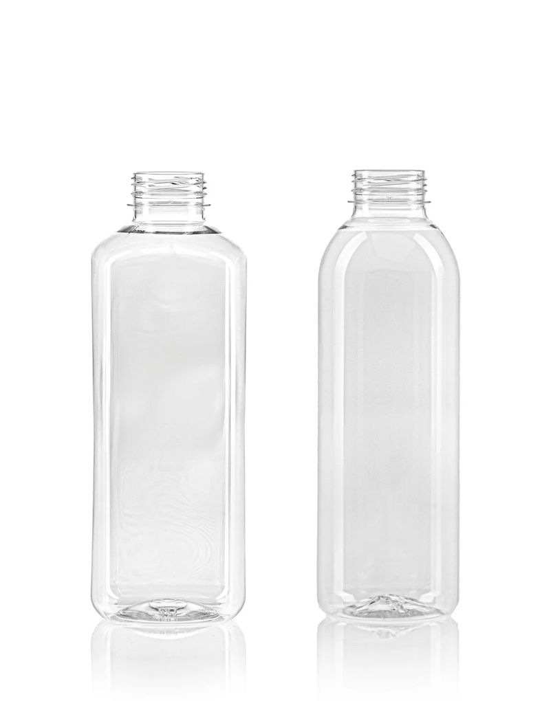 Two clear, empty plastic bottles with screw tops, standing upright against a white background.