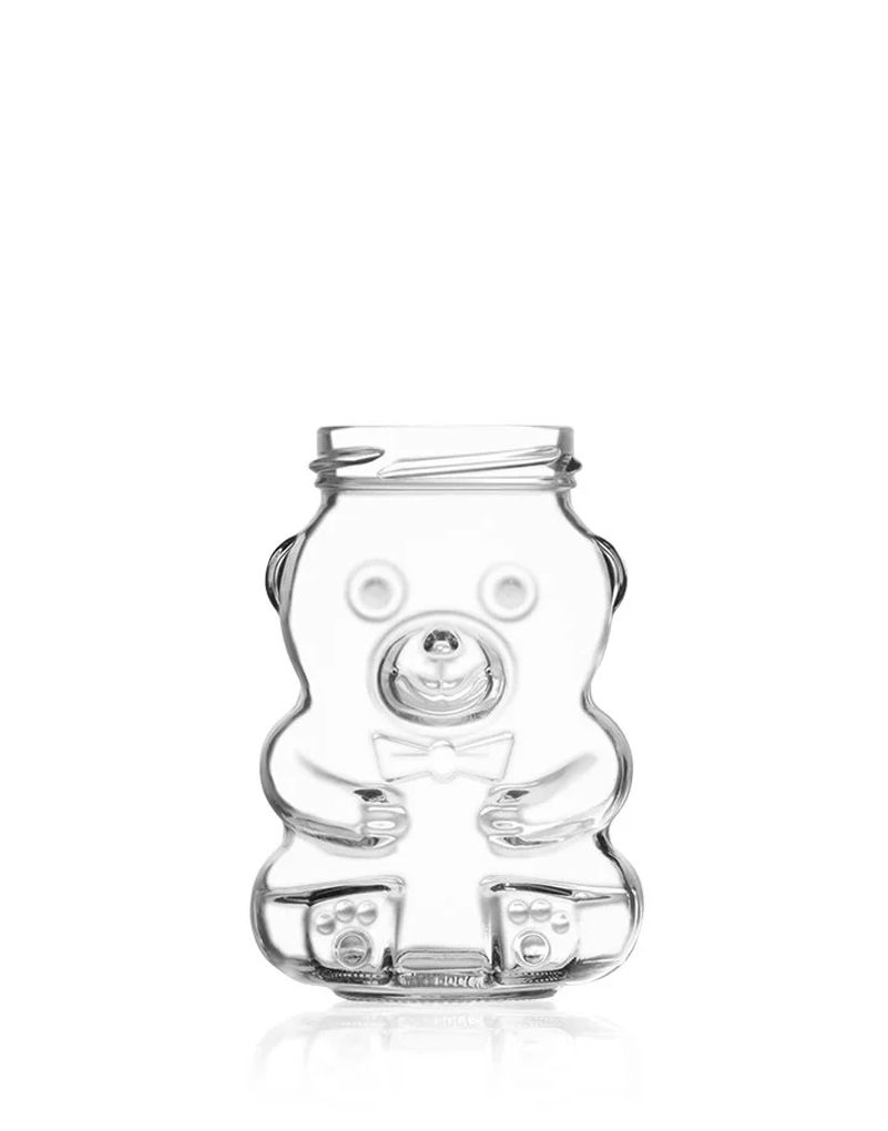 other_glass_jars A clear glass jar shaped like a bear, with detailed features including eyes, nose, and a bow tie, against a white background.