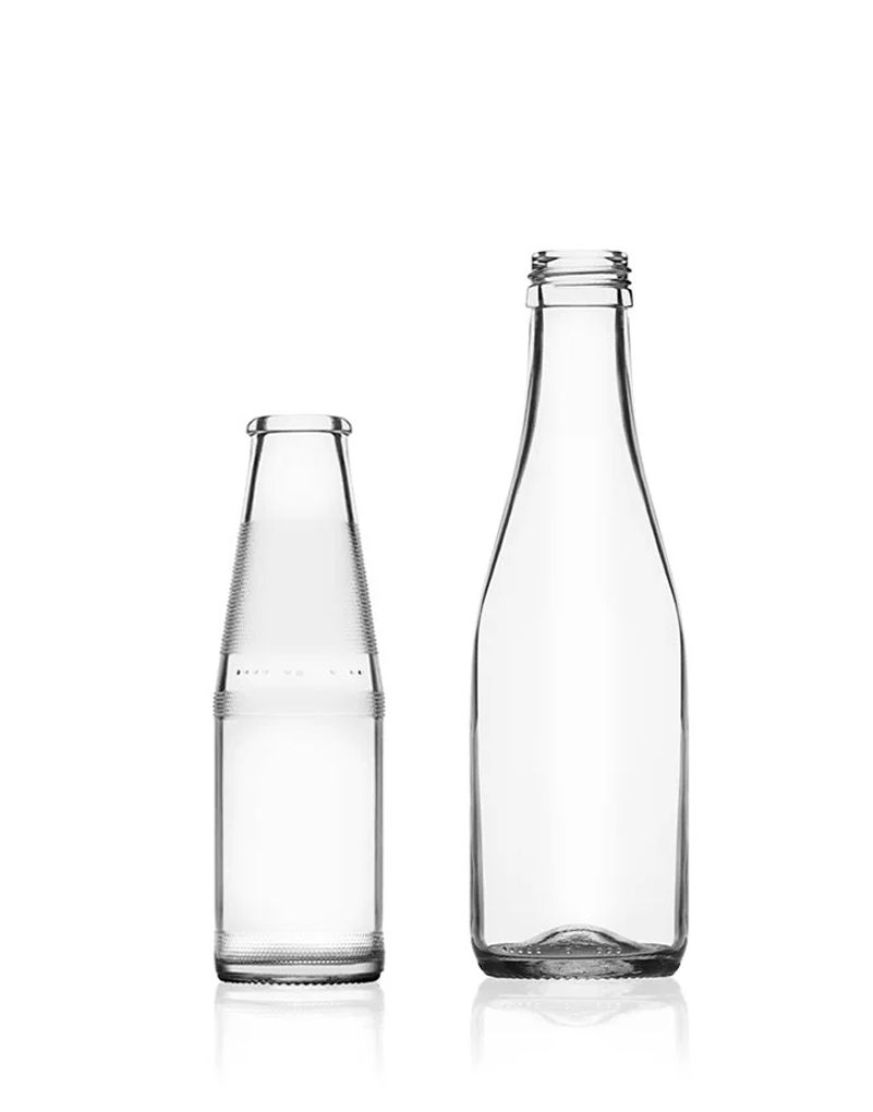 Two empty glass bottles, one short and wide, the other tall and narrow, displayed against a plain white background.