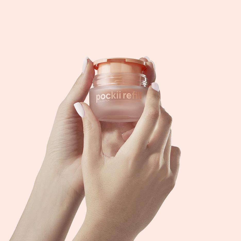 Pockii Refill Jar 50 ml by Berlin Packaging Beauty, refillable cosmetic jar held by hands, highlighting compact reusable packaging design and sustainable skincare refill solution.