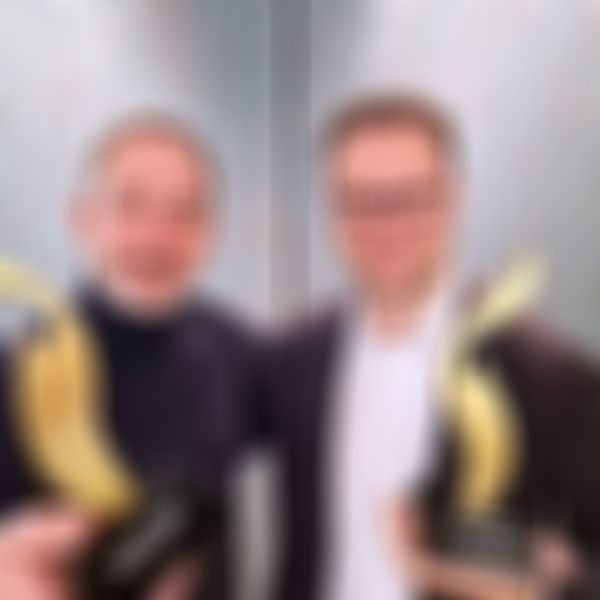 Georg Hofherr und Florian Heiß mit dem European Excellence Award