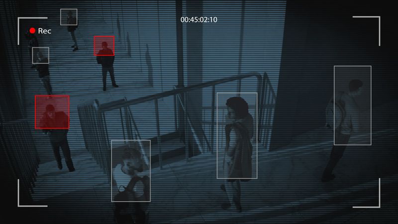Surveillance camera view of people on stairs, with some individuals highlighted in red boxes. Digital timestamp and recording icons visible.
