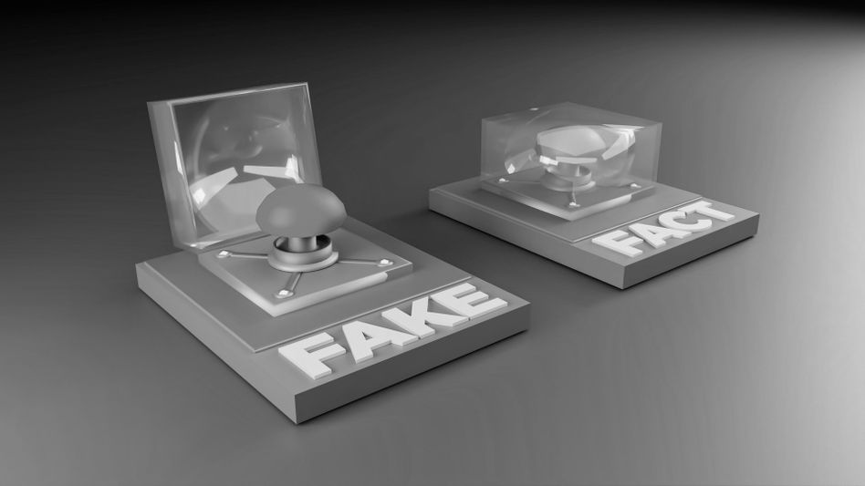 Deux boutons sous des couvertures transparentes, étiquetés « FAKE » et « FACT », sur un fond dégradé.