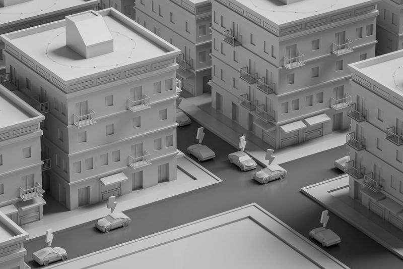 Modèle 3D monochrome d'un paysage urbain avec plusieurs bâtiments, voitures et rues, présentant des détails architecturaux simplistes.