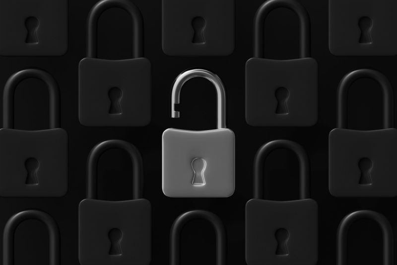 Un motif de cadenas noirs avec un cadenas argenté au centre, ouvert sur un fond sombre.