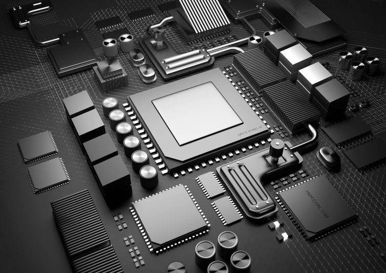 Primer plano de una placa base de computadora con múltiples circuitos, chips y componentes, con una unidad central de procesamiento y varios conectores.