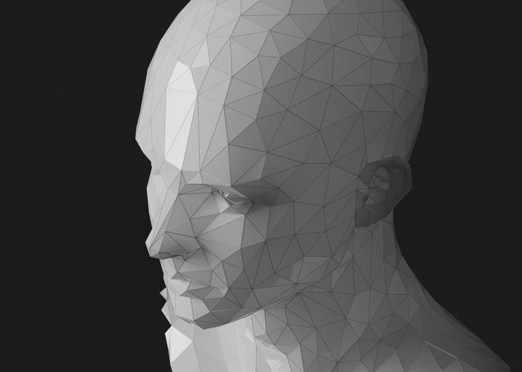 Modèle 3D low-poly d'une tête humaine aux surfaces polygonales géométriques, représenté de profil sur fond sombre.