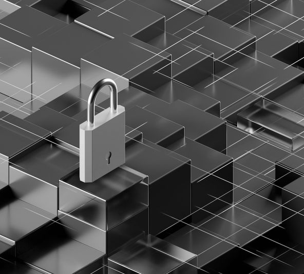 A silver padlock on a grid of interlocking black and transparent cubes, symbolizing security and protection in a digital environment.