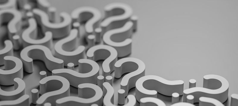 3D graphics with scattered white question marks