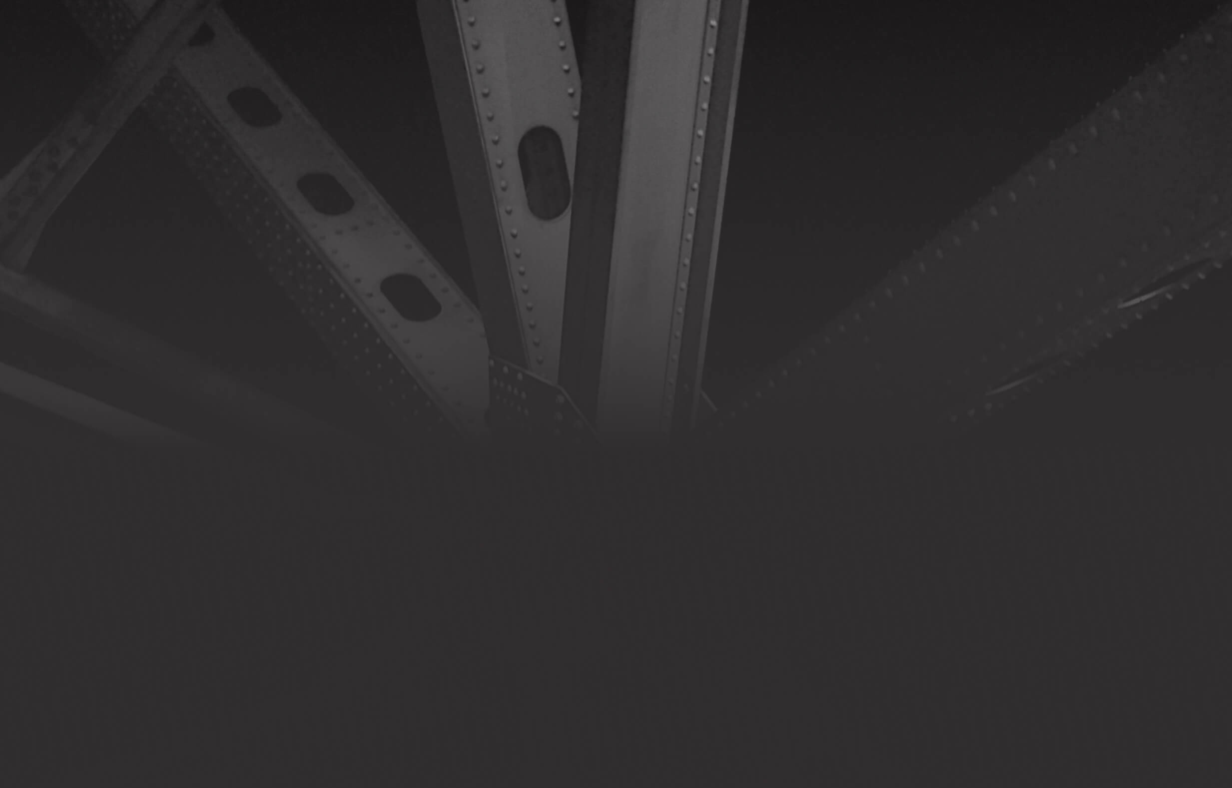 Dark industrial steel beams with rivets