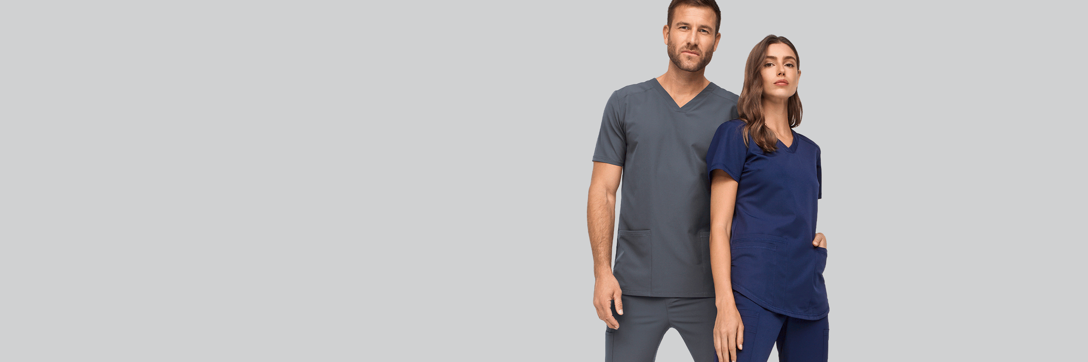 En GIF med två modeller i olika poser i Active-Stretch-arbetskläder från 7days