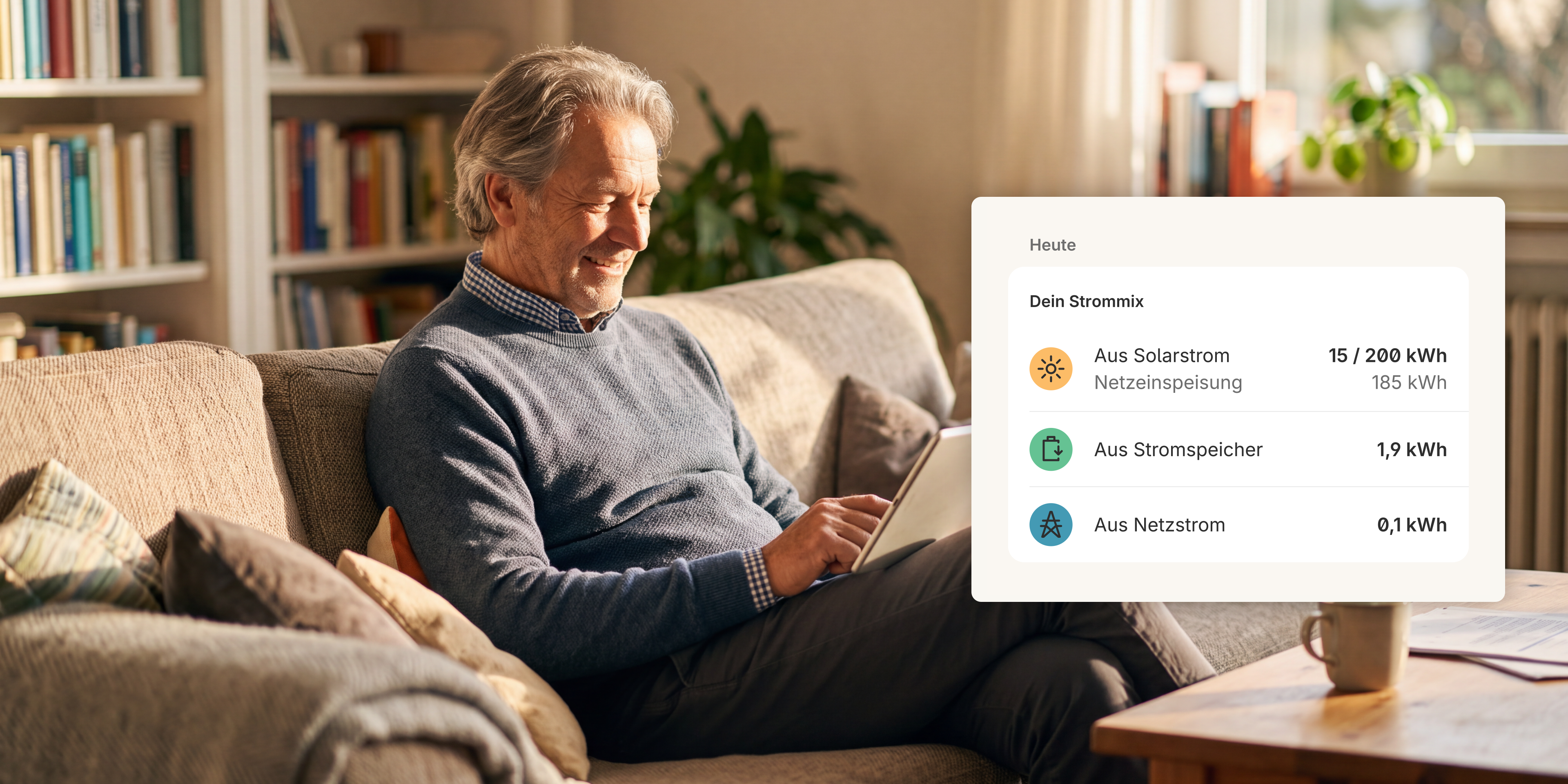 Mann auf dem Sofa schaut auf Tablet
