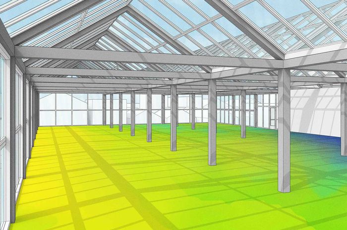 Groot, door de zon verlicht interieur met blootliggende balken, een glazen dak en een vloer met een kleurverloop die overgaat van geel naar groen en blauw.