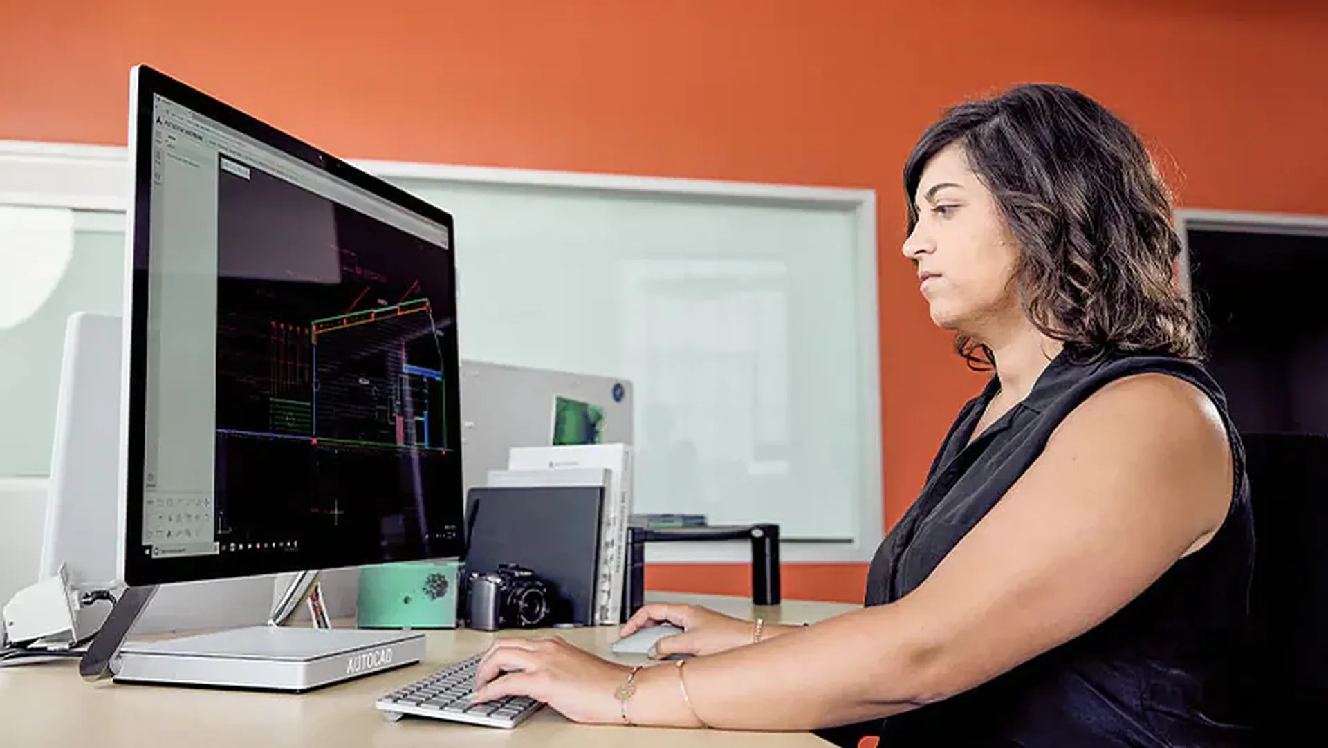 woman working on a dwg plan