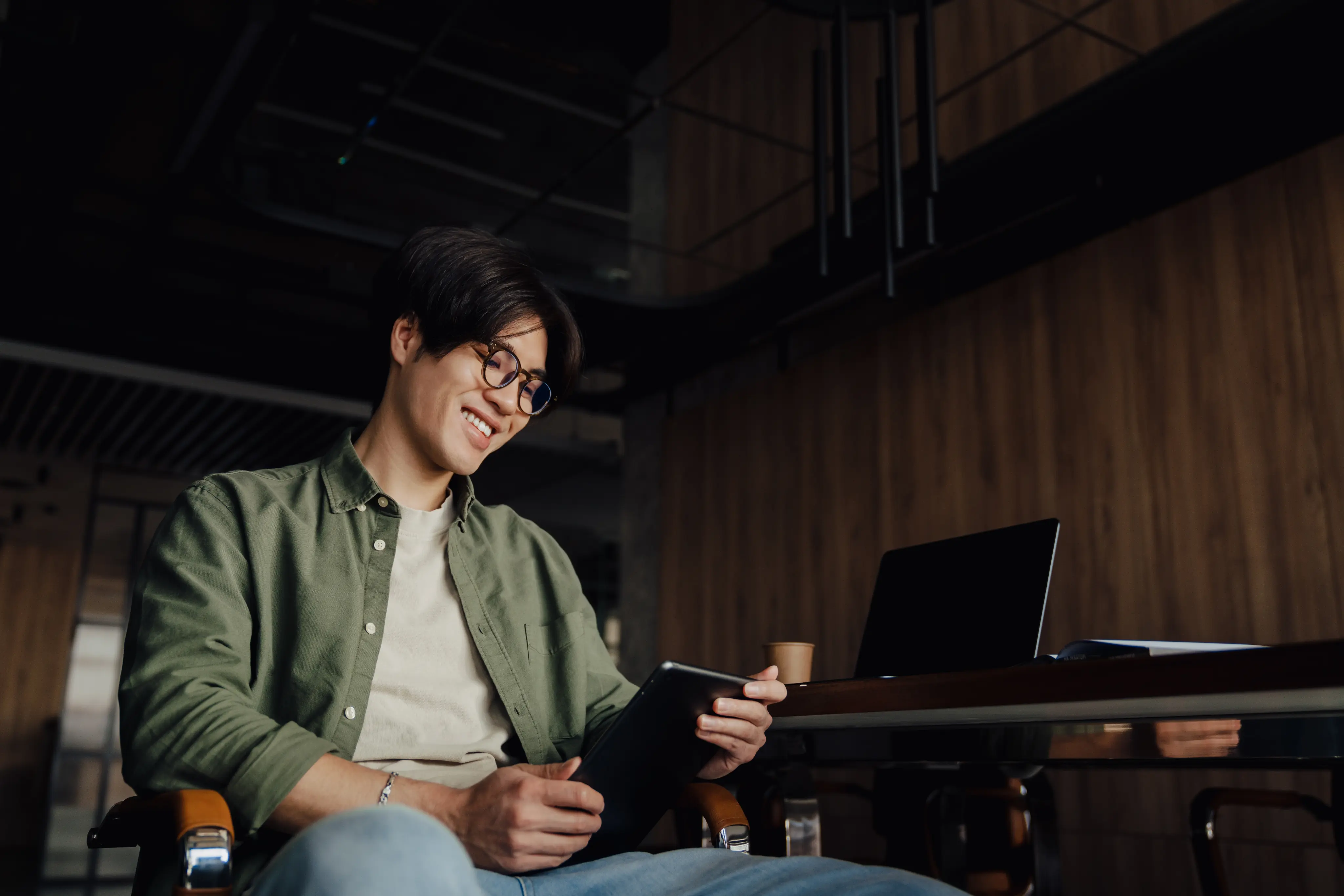 A person looking at their eSIM-enabled tablet